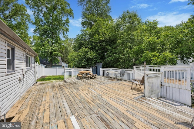 1013 S Scott Ave, Lindenwold, NJ 08021 - wooden deck featuring outdoor dining area and view of wooded area