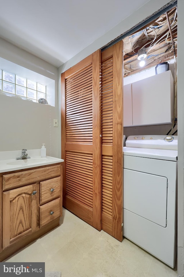 2904 Spring Valley Rd, Lancaster, PA 17601 - laundry area featuring washer / clothes dryer, plenty of natural light, and cabinet space