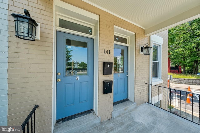 141 NE V St NE, Washington, DC 20002 - property entrance with covered porch and brick siding