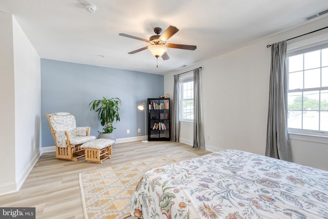 3111 Tilden Dr, Baltimore, MD 21211 - bedroom with light wood-style flooring, baseboards, and a ceiling fan