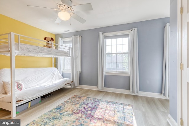 3111 Tilden Dr, Baltimore, MD 21211 - bedroom featuring wood finished floors, baseboards, and ceiling fan