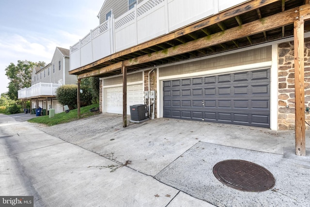 3111 Tilden Dr, Baltimore, MD 21211 - garage with cooling unit and concrete driveway
