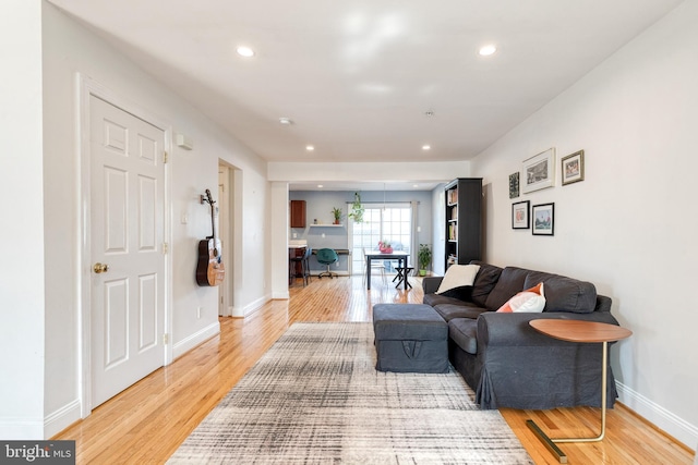 3111 Tilden Dr, Baltimore, MD 21211 - living area featuring light wood-style floors, recessed lighting, and baseboards