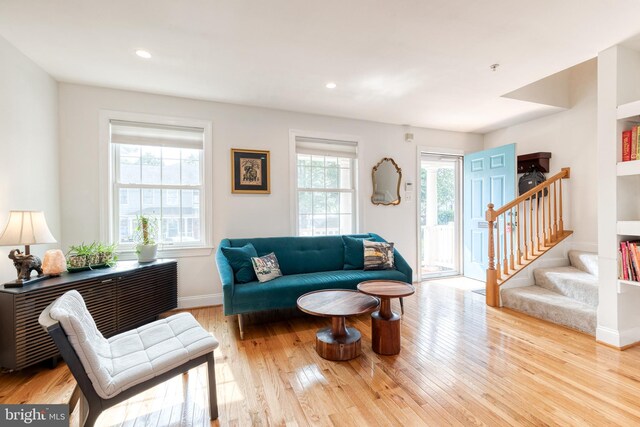 3111 Tilden Dr, Baltimore, MD 21211 - living room with stairs, wood finished floors, baseboards, and recessed lighting