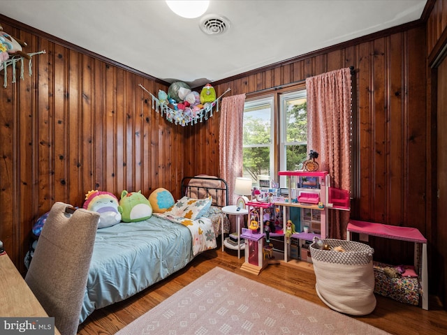 117 Washington Ave, Front Royal, VA 22630 - bedroom with wood walls and wood finished floors