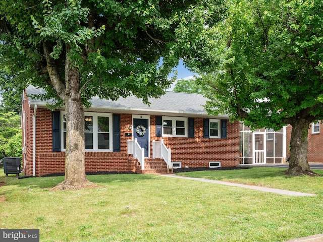 117 Washington Ave, Front Royal, VA 22630 - view of front facade with brick siding, entry steps, a front lawn, and a shingled roof