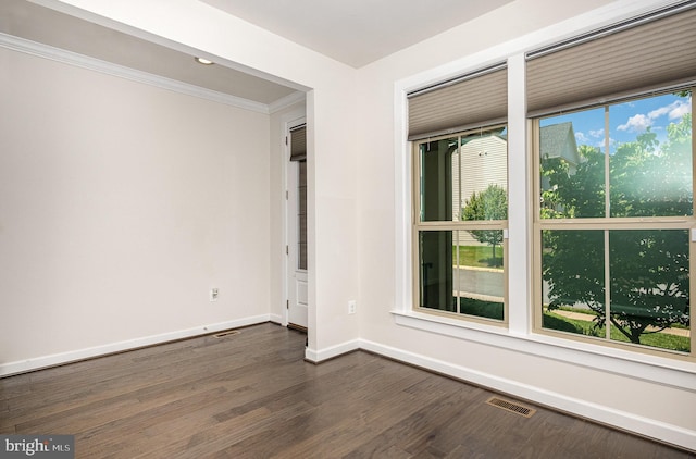 9073 Bear Branch Pl, Fairfax, VA 22031 - spare room featuring baseboards, dark wood-type flooring, and ornamental molding