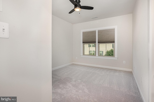 9073 Bear Branch Pl, Fairfax, VA 22031 - unfurnished room with light colored carpet, a ceiling fan, and baseboards