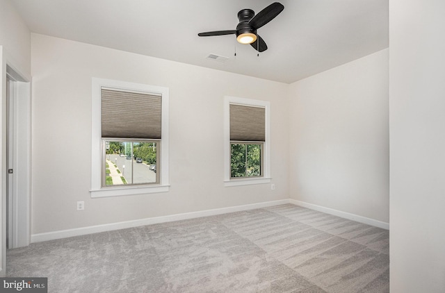 9073 Bear Branch Pl, Fairfax, VA 22031 - unfurnished room with healthy amount of natural light, carpet flooring, and baseboards