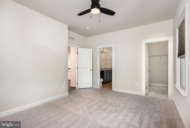 9073 Bear Branch Pl, Fairfax, VA 22031 - unfurnished bedroom featuring carpet, a closet, a spacious closet, and baseboards