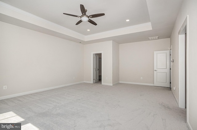 9073 Bear Branch Pl, Fairfax, VA 22031 - unfurnished bedroom with ornamental molding, light carpet, a tray ceiling, recessed lighting, and baseboards