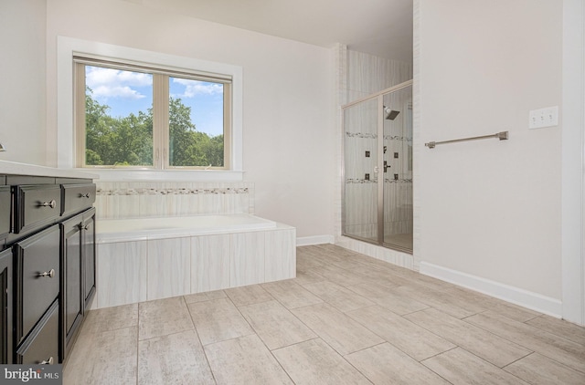 9073 Bear Branch Pl, Fairfax, VA 22031 - full bathroom with a stall shower, a bath, and vanity