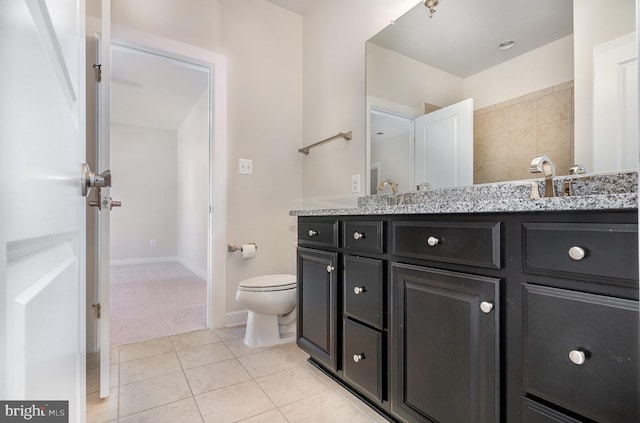 9073 Bear Branch Pl, Fairfax, VA 22031 - bathroom featuring double vanity, toilet, tile patterned floors, and baseboards