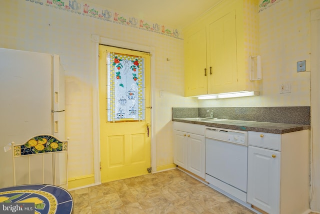 122 Merion Ave, Narberth, PA 19072 - kitchen featuring white appliances, dark countertops, white cabinetry, and baseboards