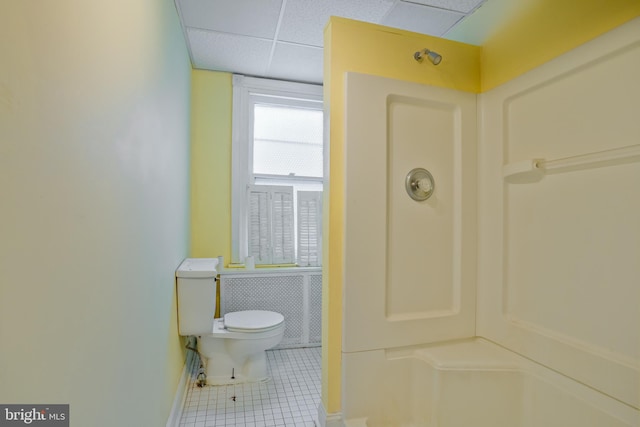 122 Merion Ave, Narberth, PA 19072 - bathroom with a shower, toilet, tile patterned flooring, baseboards, and a paneled ceiling