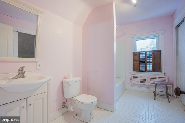 122 Merion Ave, Narberth, PA 19072 - bathroom with vanity, toilet, shower / washtub combination, tile patterned floors, and lofted ceiling