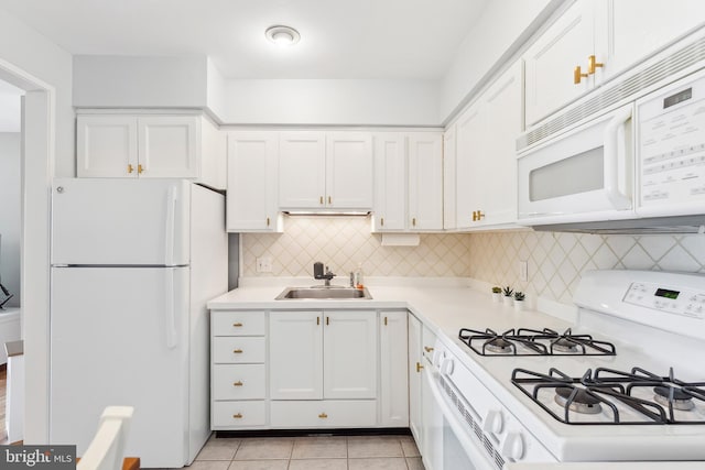 1350 Virginia Ave, Cape May, NJ 08204 - kitchen with white appliances, a sink, white cabinetry, and light countertops