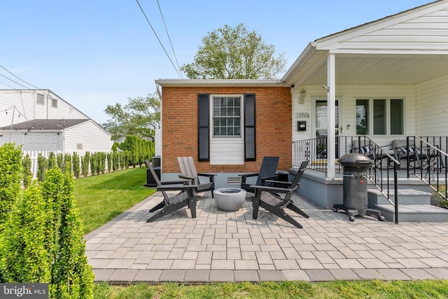 1350 Virginia Ave, Cape May, NJ 08204 - porch featuring an outdoor fire pit and a yard