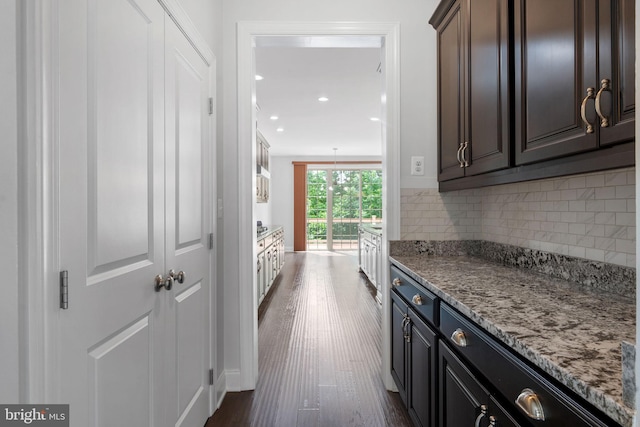 22559 Windsor Locks Sq, Ashburn, VA 20148 - hallway with dark wood-style flooring and recessed lighting