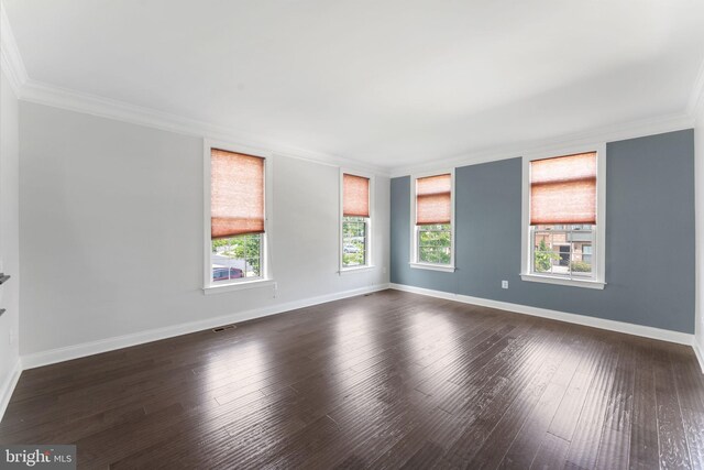 22559 Windsor Locks Sq, Ashburn, VA 20148 - unfurnished room with crown molding, dark wood-style flooring, and baseboards