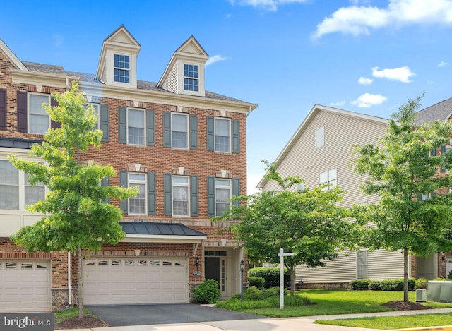 22559 Windsor Locks Sq, Ashburn, VA 20148 - multi unit property featuring brick siding, driveway, and an attached garage