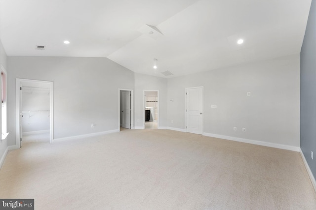 22559 Windsor Locks Sq, Ashburn, VA 20148 - unfurnished living room featuring vaulted ceiling, light colored carpet, baseboards, and recessed lighting