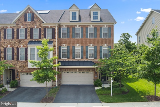 22559 Windsor Locks Sq, Ashburn, VA 20148 - multi unit property with driveway, brick siding, a garage, and roof with shingles