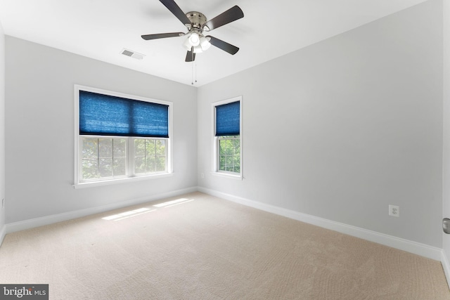 22559 Windsor Locks Sq, Ashburn, VA 20148 - carpeted spare room with baseboards and a ceiling fan