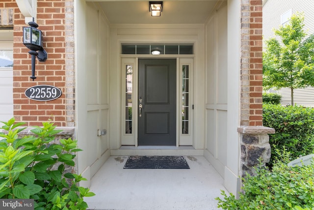 22559 Windsor Locks Sq, Ashburn, VA 20148 - view of exterior entry featuring brick siding