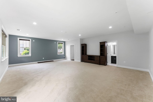 22559 Windsor Locks Sq, Ashburn, VA 20148 - unfurnished living room with light carpet, recessed lighting, and baseboards