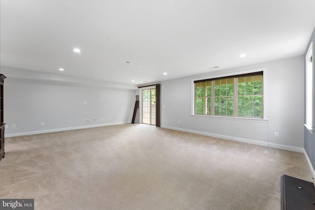 22559 Windsor Locks Sq, Ashburn, VA 20148 - spare room with recessed lighting, light colored carpet, and baseboards