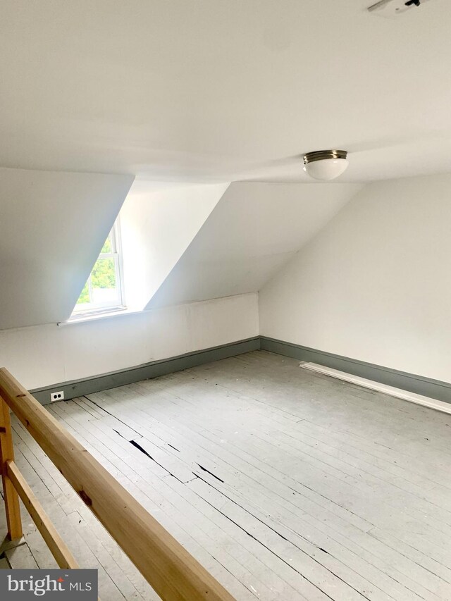 42 E 5th St, New Castle, DE 19720 - additional living space featuring vaulted ceiling and wood-type flooring