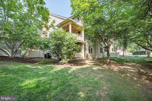 5810 Linden Square Ct, North Bethesda, MD 20852 - view of grassy yard featuring a balcony