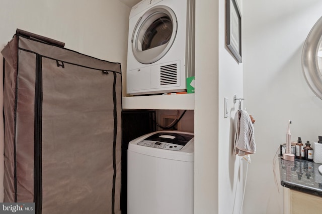 200 Lombard St Unit 728, Philadelphia, PA 19147 - laundry room featuring stacked washer / dryer