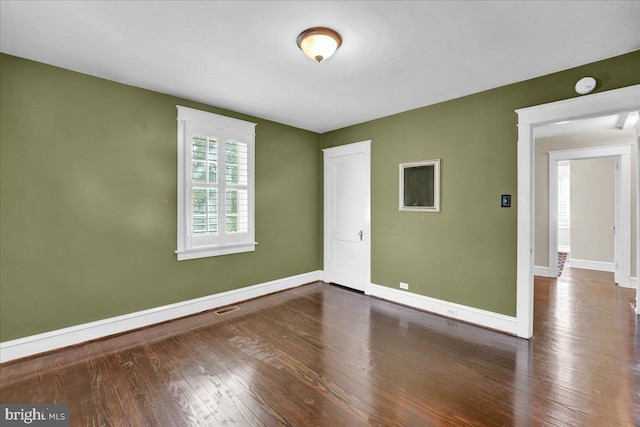 802 E Prospect Ave, North Wales, PA 19454 - empty room featuring baseboards, hardwood / wood-style floors, and a smoke detector