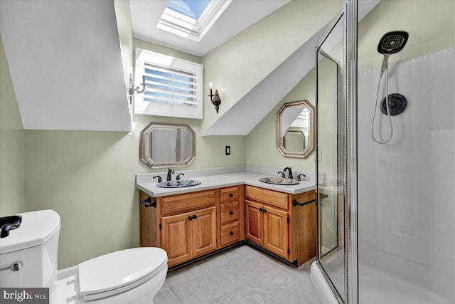 802 E Prospect Ave, North Wales, PA 19454 - full bathroom with toilet, a skylight, a stall shower, double vanity, and tile patterned floors