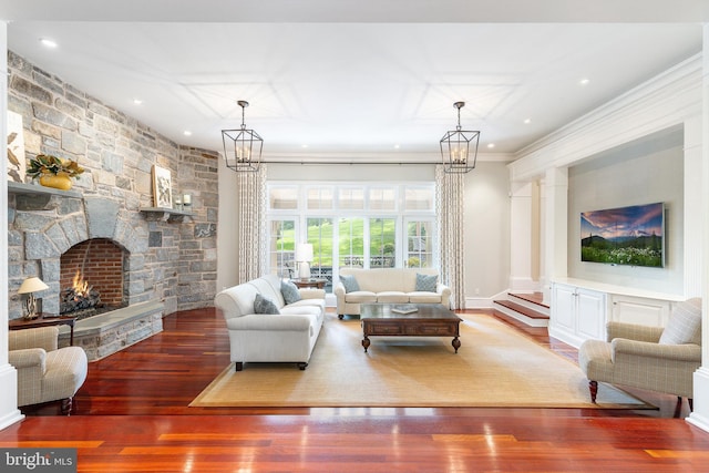 1412 Mount Pleasant Rd, Villanova, PA 19085 - living room featuring wood finished floors, a fireplace, recessed lighting, a chandelier, and crown molding