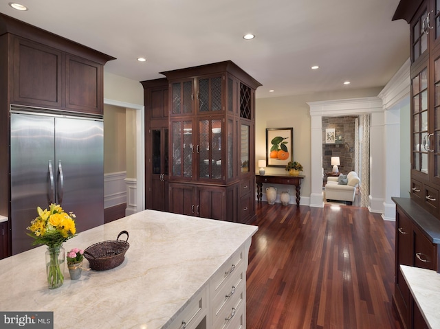 1412 Mount Pleasant Rd, Villanova, PA 19085 - kitchen featuring built in fridge, glass insert cabinets, dark wood-style floors, recessed lighting, and light stone counters
