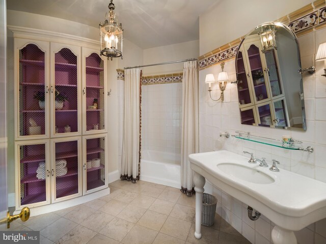 1412 Mount Pleasant Rd, Villanova, PA 19085 - full bathroom featuring shower / bath combo with shower curtain, a sink, and tile patterned flooring