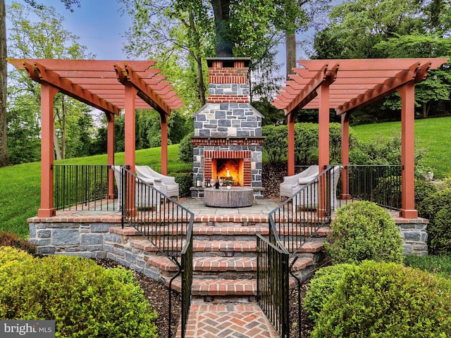 1412 Mount Pleasant Rd, Villanova, PA 19085 - view of patio featuring an outdoor stone fireplace and a pergola