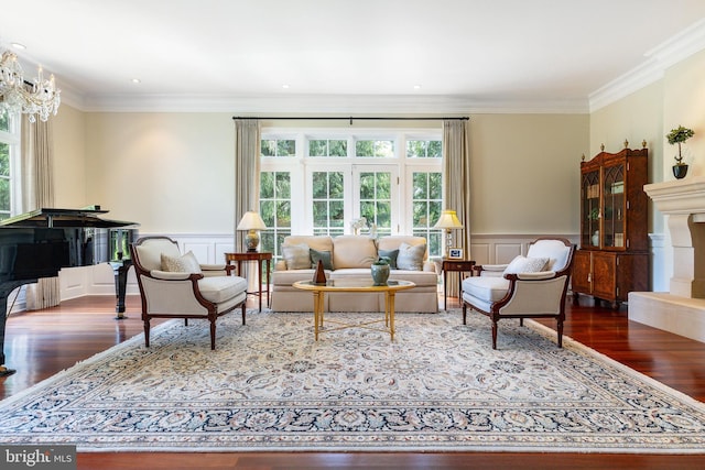1412 Mount Pleasant Rd, Villanova, PA 19085 - living room with wood finished floors, a decorative wall, ornamental molding, and a wainscoted wall
