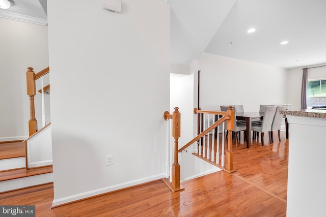 9161 Landon House Ln, Frederick, MD 21704 - corridor with light wood-type flooring, recessed lighting, baseboards, ornamental molding, and stairway