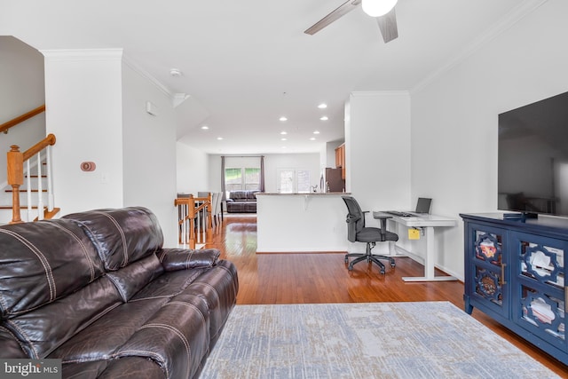 9161 Landon House Ln, Frederick, MD 21704 - living area with wood finished floors, a ceiling fan, ornamental molding, an office area, and recessed lighting