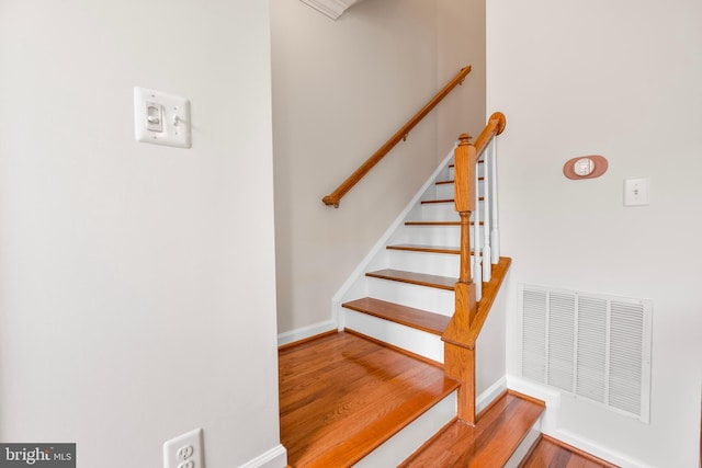 9161 Landon House Ln, Frederick, MD 21704 - stairs featuring baseboards and wood finished floors