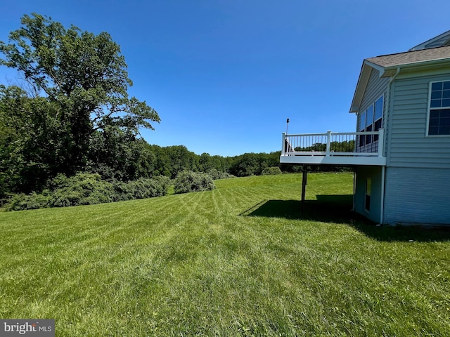 15960 Kruhm Rd, Burtonsville, MD 20866 - view of green lawn featuring a deck