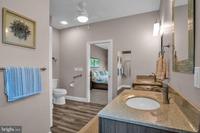 61 Bragg Dr, East Berlin, PA 17316 - ensuite bathroom with double vanity, wood finished floors, and a ceiling fan