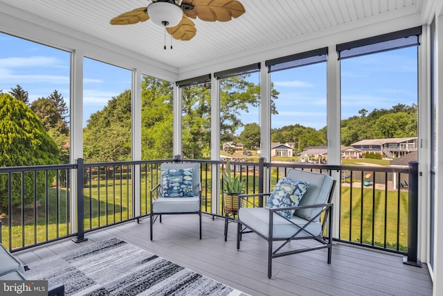 61 Bragg Dr, East Berlin, PA 17316 - sunroom / solarium featuring a ceiling fan, healthy amount of natural light, and view of wooded area