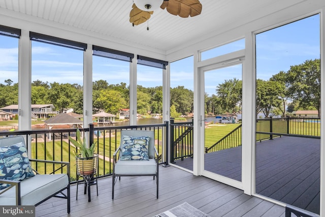 61 Bragg Dr, East Berlin, PA 17316 - sunroom with a ceiling fan, view of scattered trees, and a water view