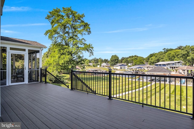 61 Bragg Dr, East Berlin, PA 17316 - wooden deck with a residential view, a sunroom, and a lawn