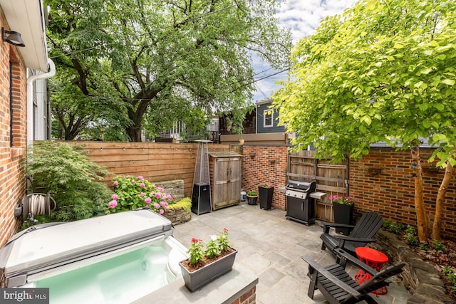 1217 Carrollsburg Pl SW, Washington, DC 20024 - fenced backyard with grilling area and a patio area